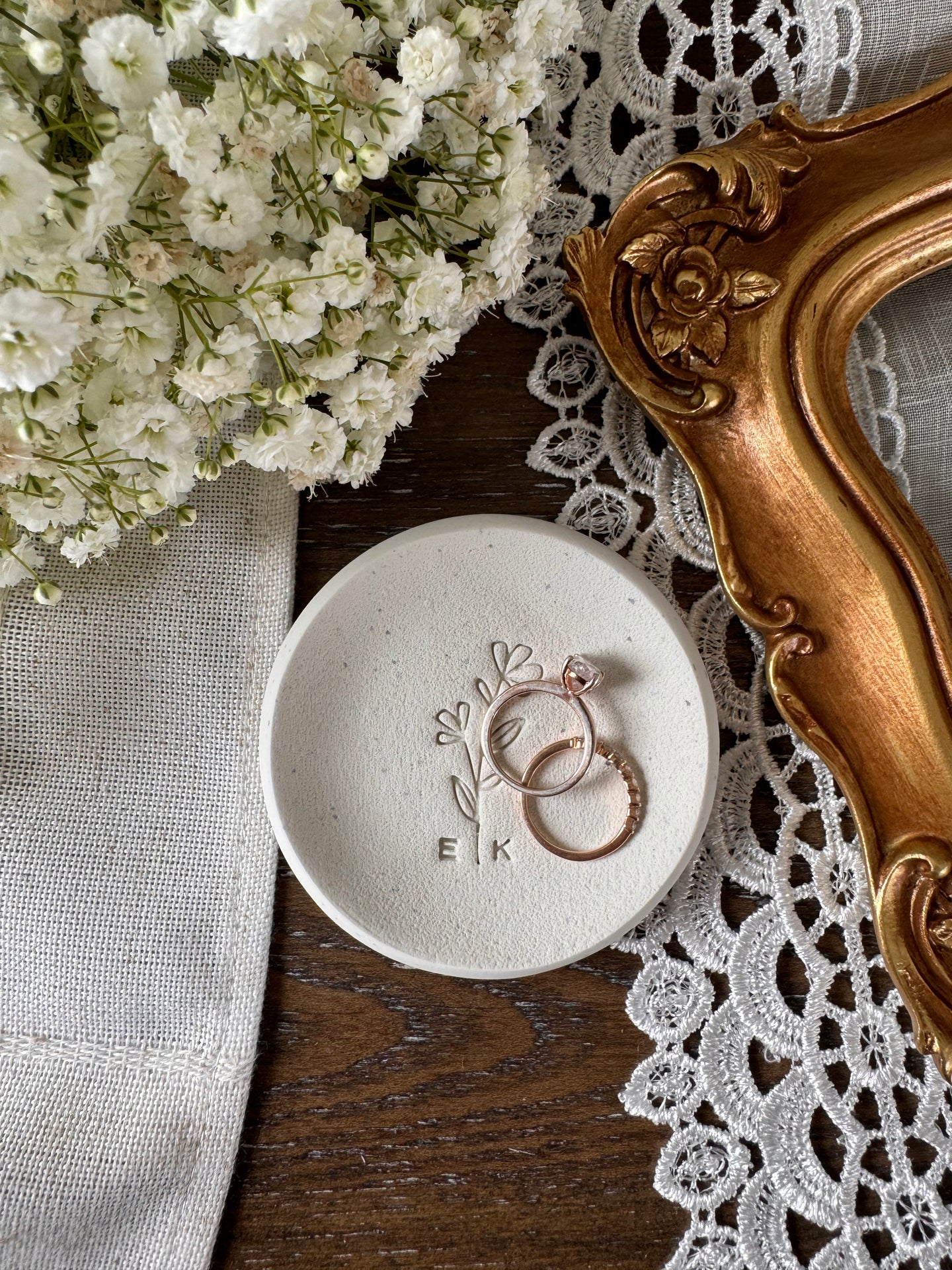 white clay ring dish with floral embossed design in center and personalized initials, perfect for brides